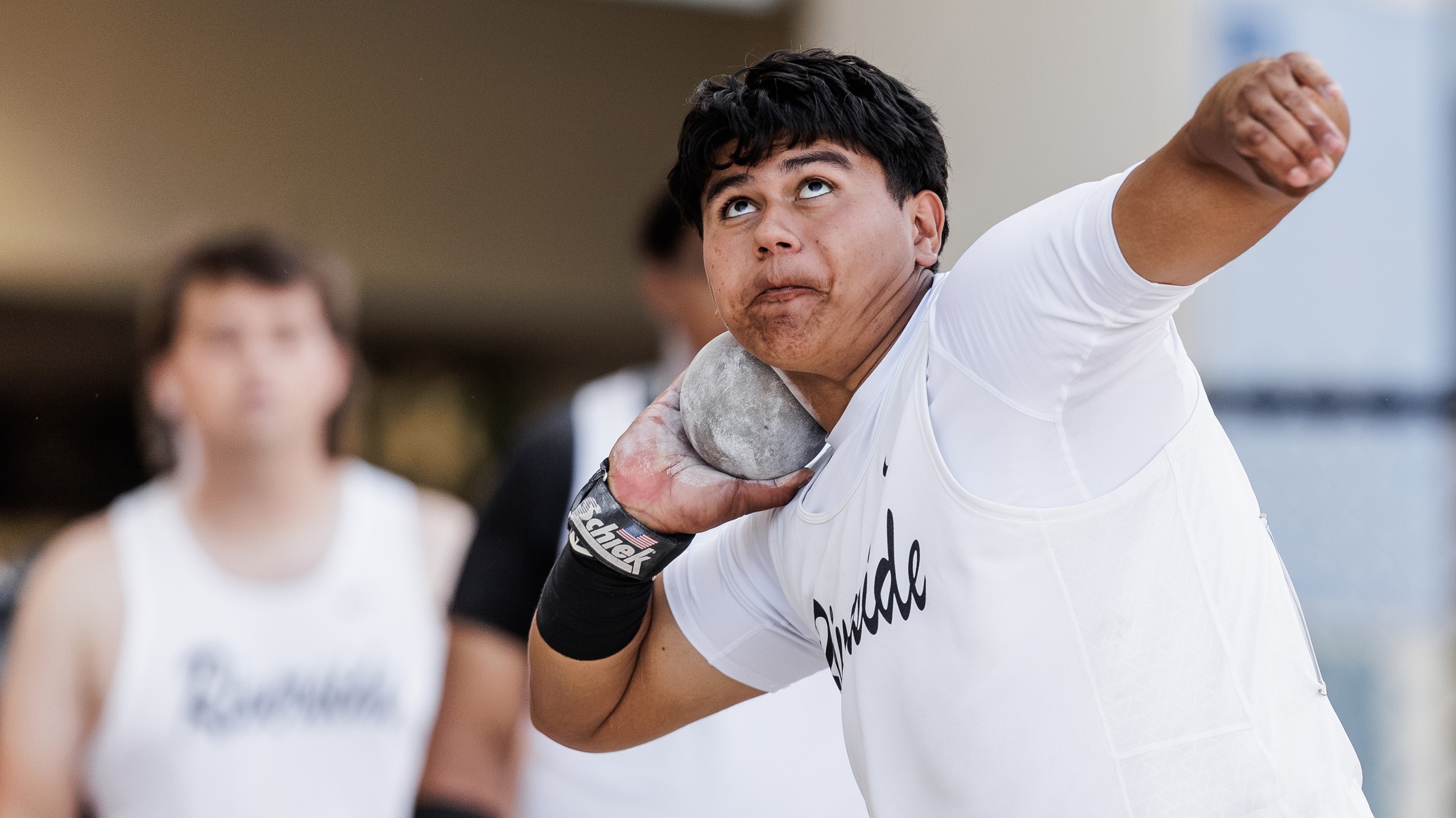Men's shot putter gets ready to throw the shot put